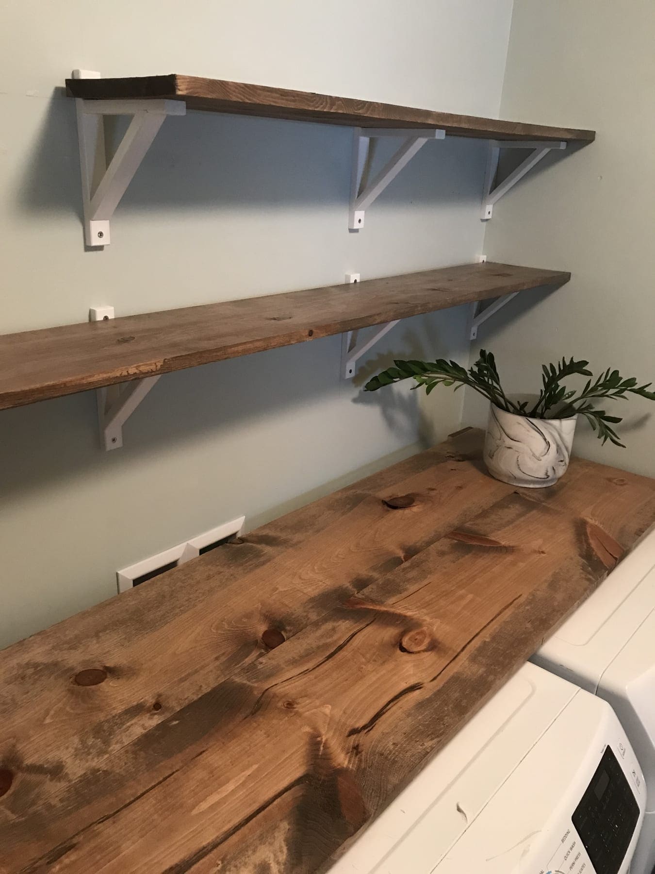 Live-edge walnut shelf custom-built for a Somerset, KY home