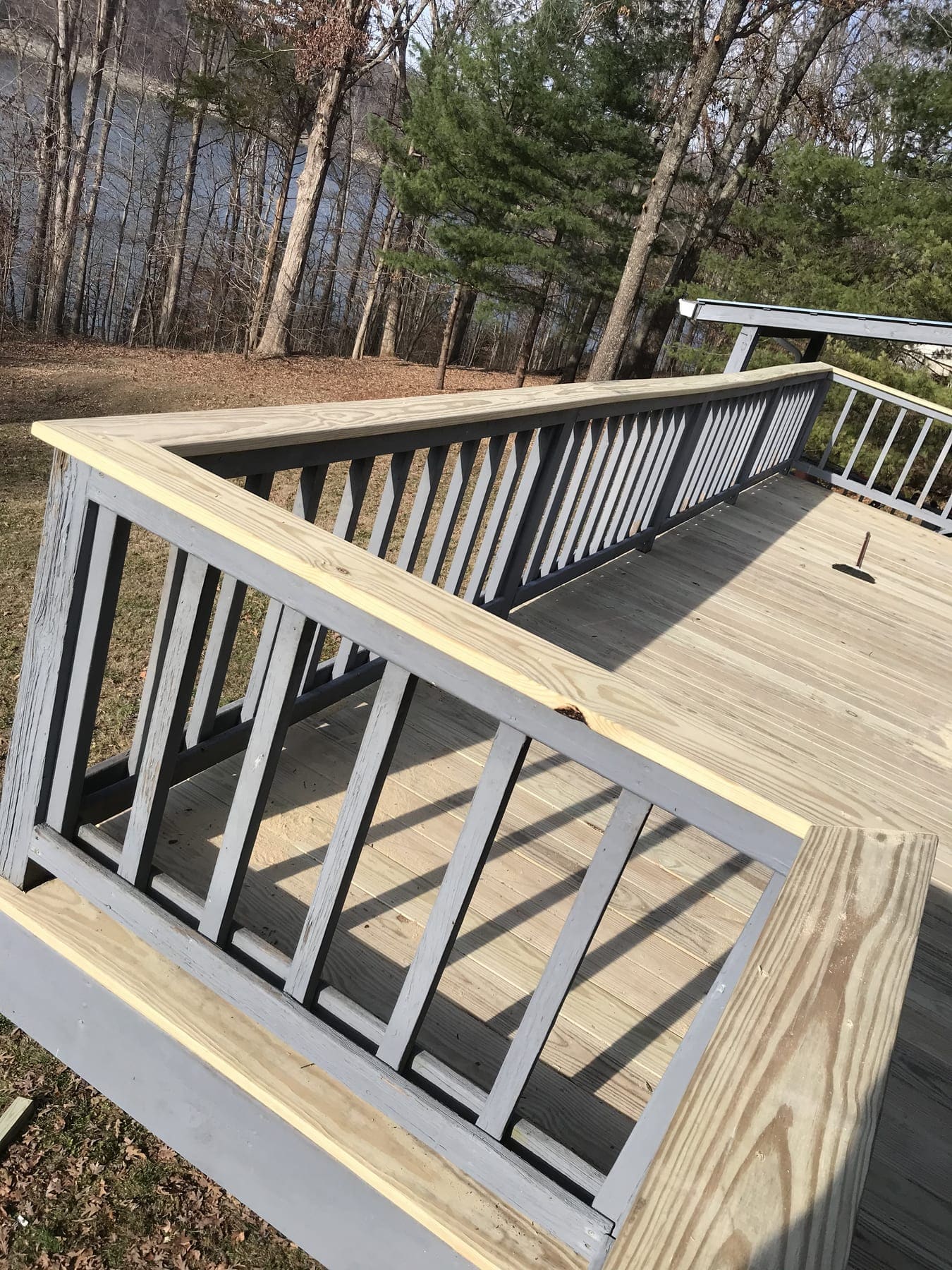 Custom cedar deck with railings on a Somerset, KY home by Rust & Sawdust